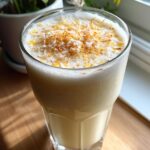 Banana Coconut Crush Mocktail – Creamy banana and coconut blended into a chilled island-style drink.