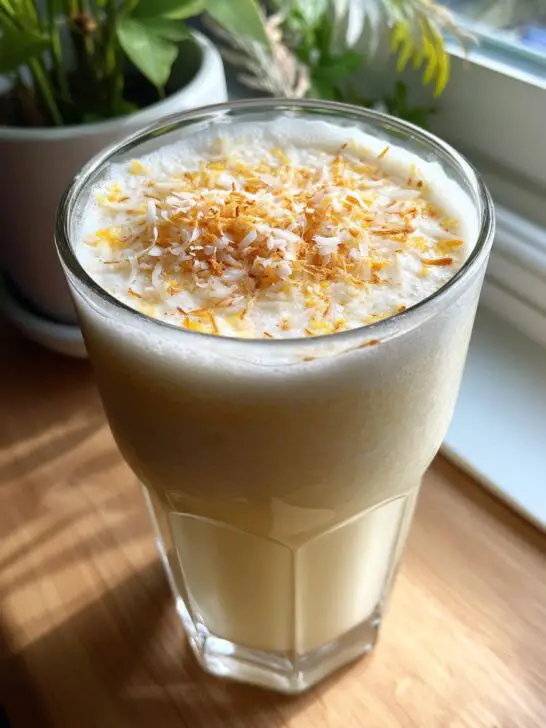 Banana Coconut Crush Mocktail – Creamy banana and coconut blended into a chilled island-style drink.
