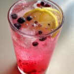 Berry Lemonade Sparkle Mocktail – Mixed berry puree combined with lemon juice and sparkling water.
