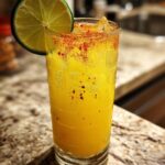 Chili Pineapple Punch Mocktail – Sweet pineapple juice spiced up with chili and a dash of lime.