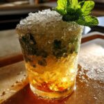 Chilled Mint Julep Cocktail with Crushed Ice and Bourbon