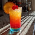 Colorful Rum Punch Cocktail with Tropical Fruit Juices