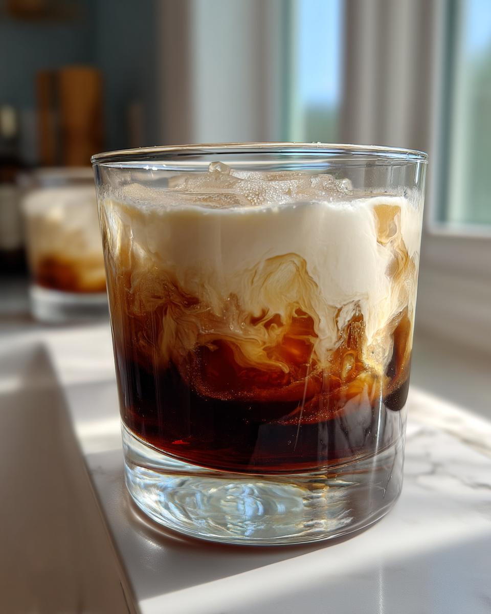 Creamy White Russian Cocktail with Vodka and Coffee Cream - detail 3