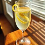 Elegant French 75 Cocktail with Gin, Lemon Juice, and Champagne