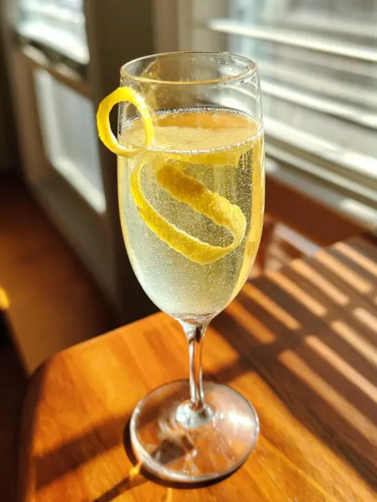 Elegant French 75 Cocktail with Gin, Lemon Juice, and Champagne