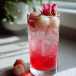 Lychee Rose Blossom Mocktail – Sweet lychee juice and fragrant rose syrup with lime and soda.