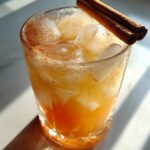 Spiced Apple Soda Mocktail – Warm apple cider flavor chilled and topped with soda water.