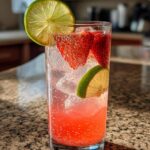 Strawberry Lime Sparkler Mocktail – Fresh strawberry puree mixed with lime juice and soda water.