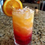 Spiced Plum Sunrise Cocktail