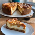 A delicious slice of Sweet Potato Caramel Cheesecake with a graham cracker crust and caramel drizzle.